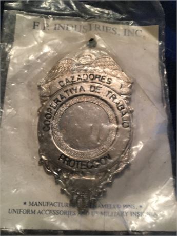 Vintage cooperative job hunters protection badge (spanish)