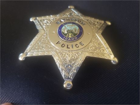 Obsolete Rathdrum, Idaho police badge. Marked Blackinton on back.