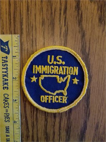 U.S. Border patrol and U.S. immigration officer round patches